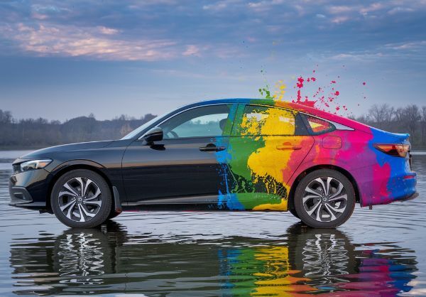 Black Honda with paint splashed Black-Honda-with-paint-splashed fender repair