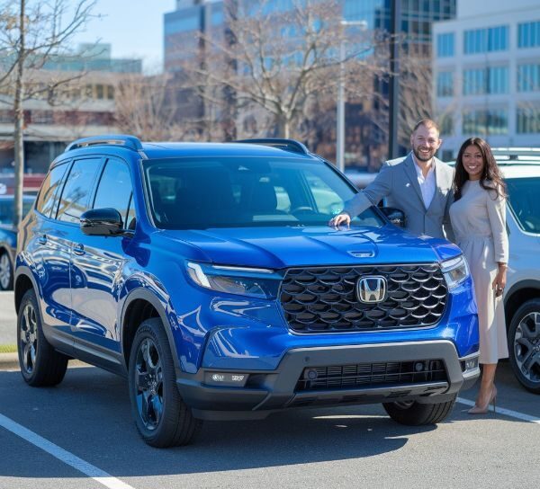 blue-2024-honda-passport-with-customer-after-Honda-certified-collision-repair-at-Collision-Care