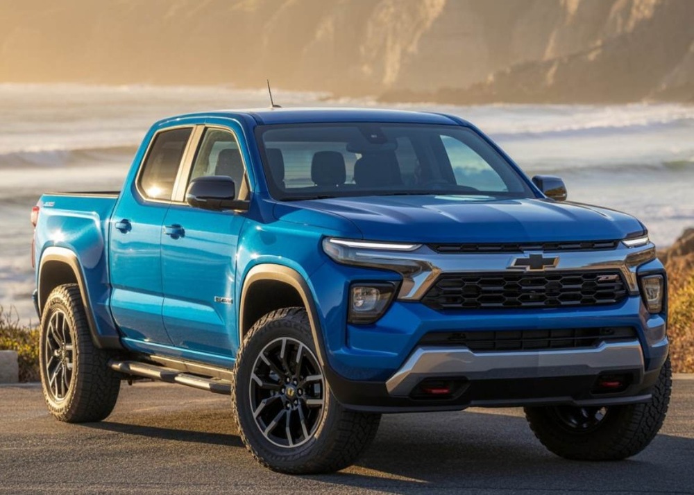 GM Collision Repair blue truck parked