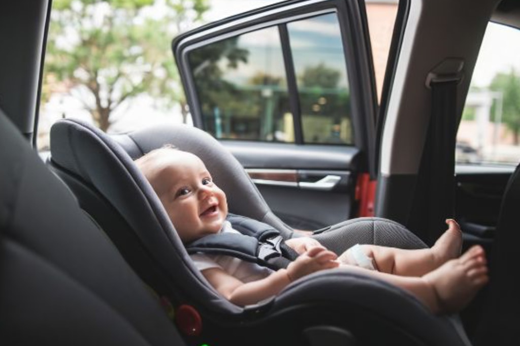 Auto Body Repair baby in seat Auto Body Repair baby in seat